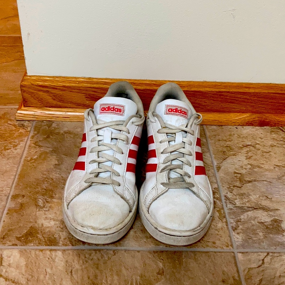 Red and white Adidas shoes